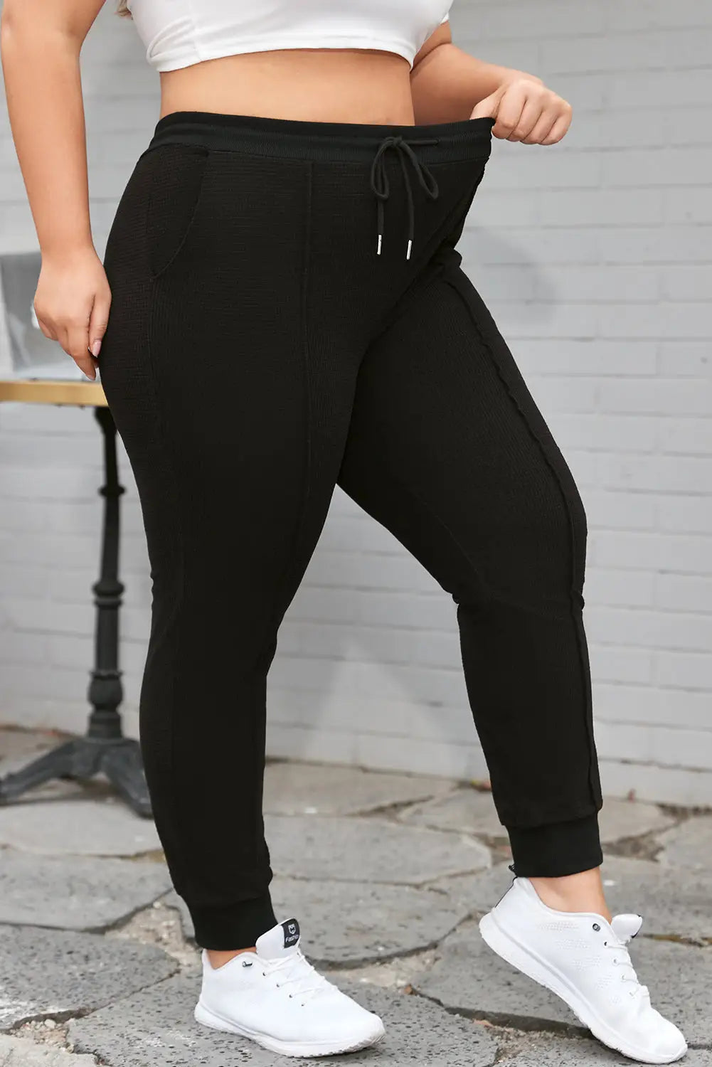 Black Plus Size Textured Exposed Seam Drawstring Jogger Pants-3