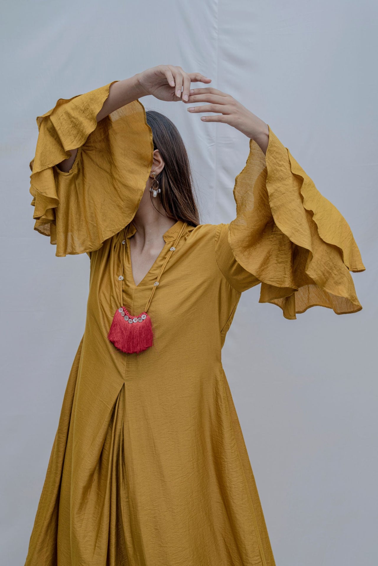 Front Pleated dress with bell sleeves in Mustard Yellow